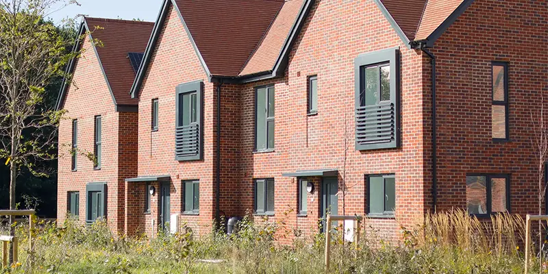 Front of houses at West Ashling Housing in South Downs National Park